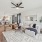 Spacious living room with wood inspired flooring